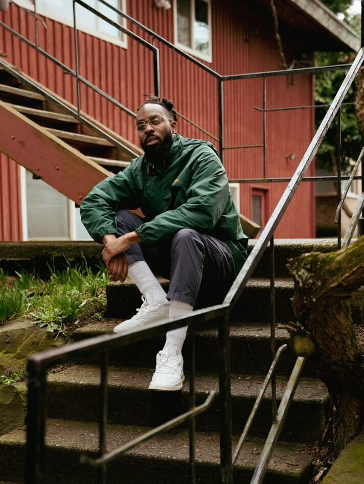 Patrick sitting on stairs